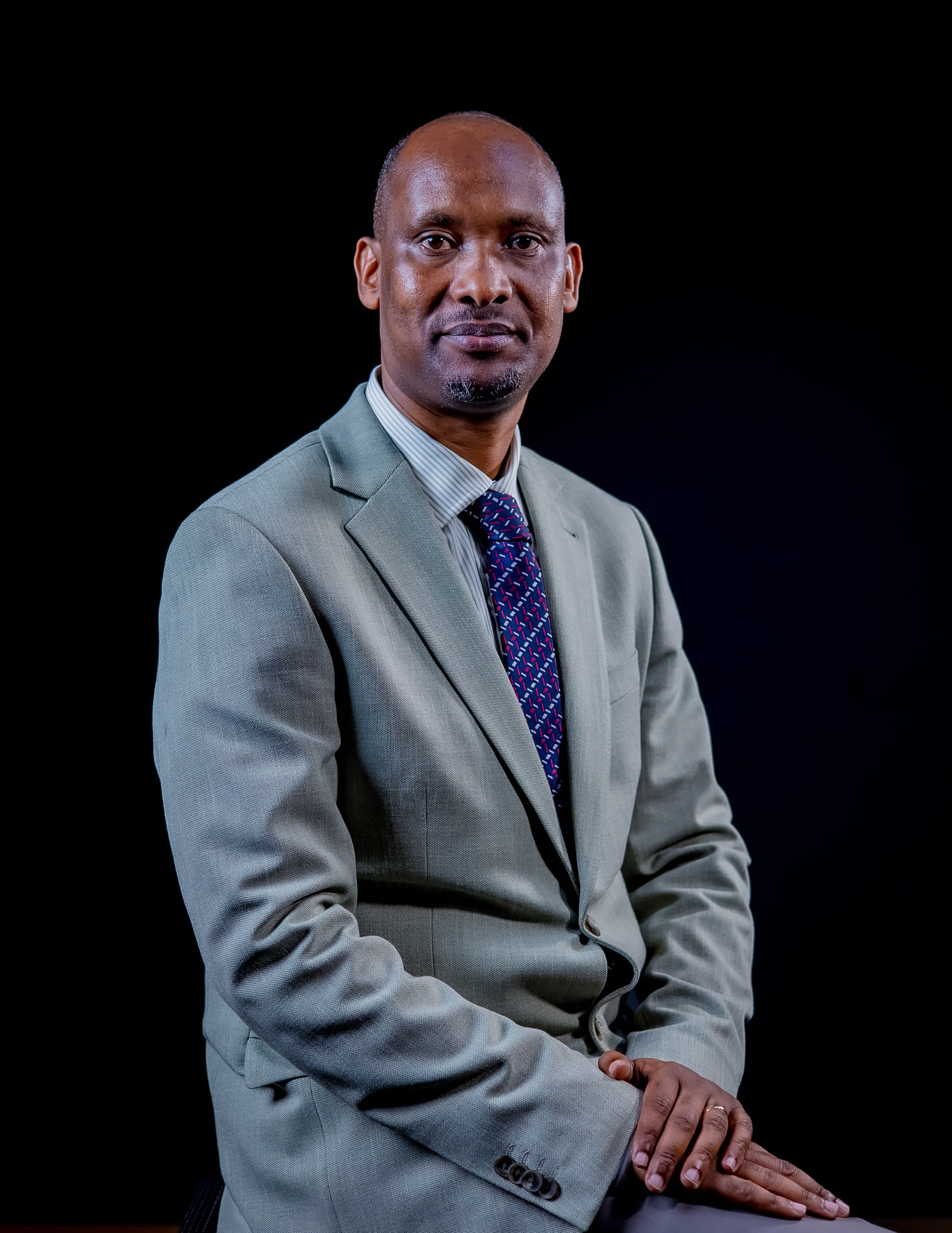 Prof Alfred Bizoza